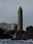 SX02443 Glendalough Round Tower in snow.jpg